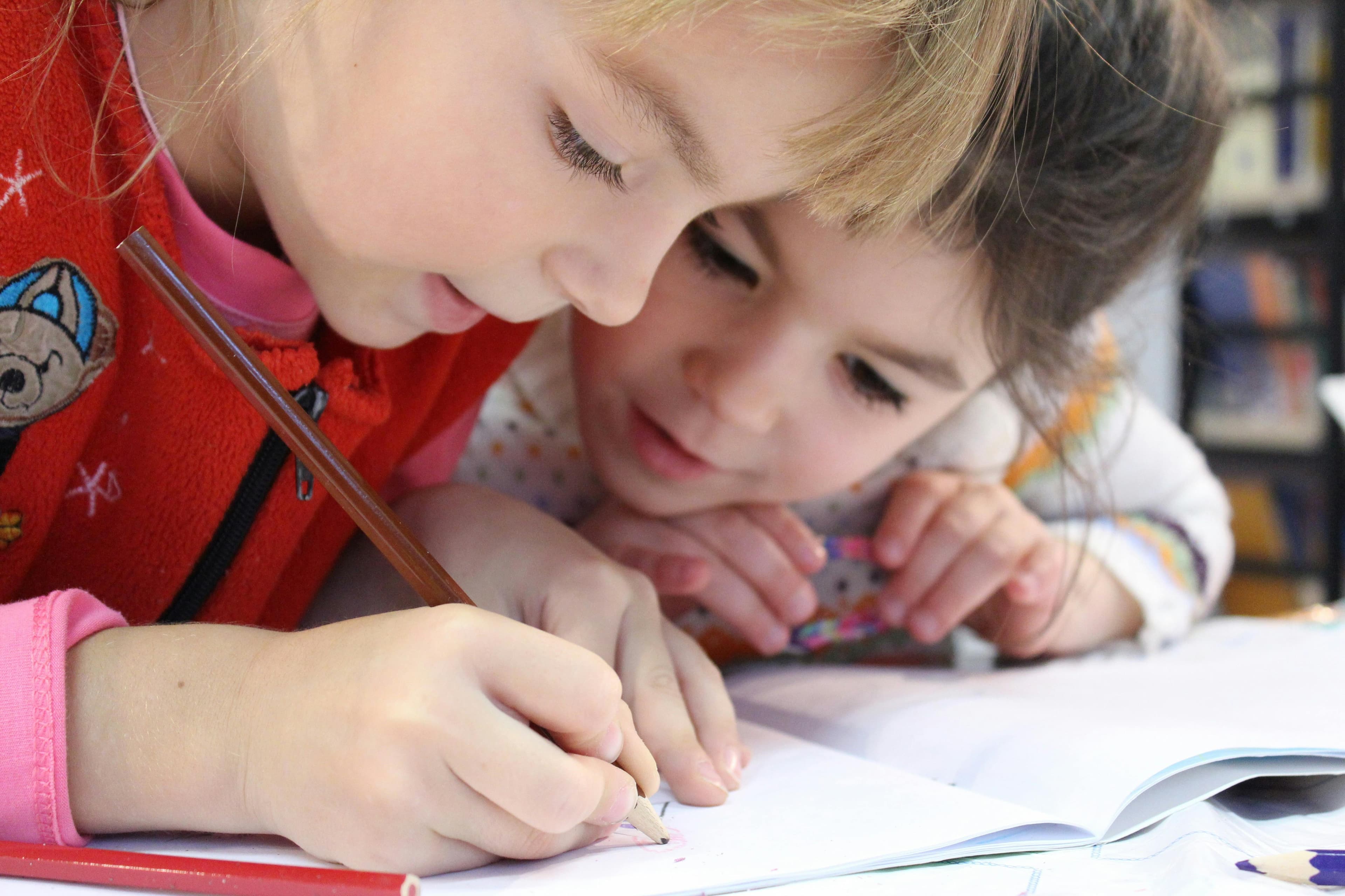 Child with their personalised colouring book — the perfect personalised gift for kids